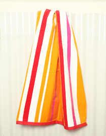 Sunny Large Striped Beach Towel hanging 